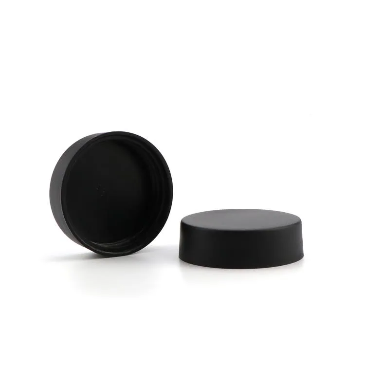 amber glass child resistant jar with black flush cap