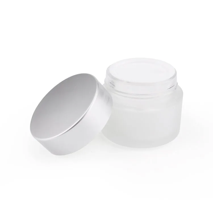 small glass cosmetic jar