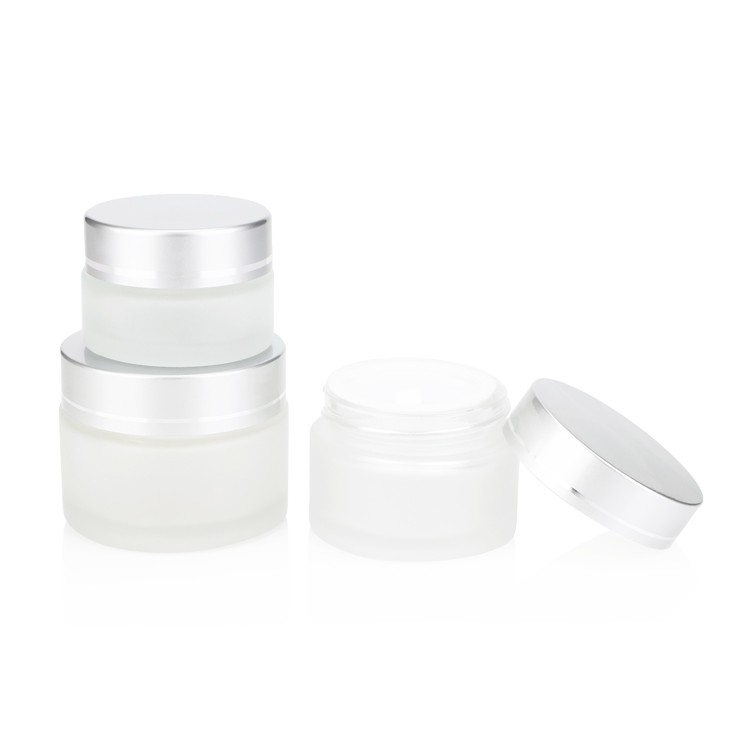 small glass makeup jars