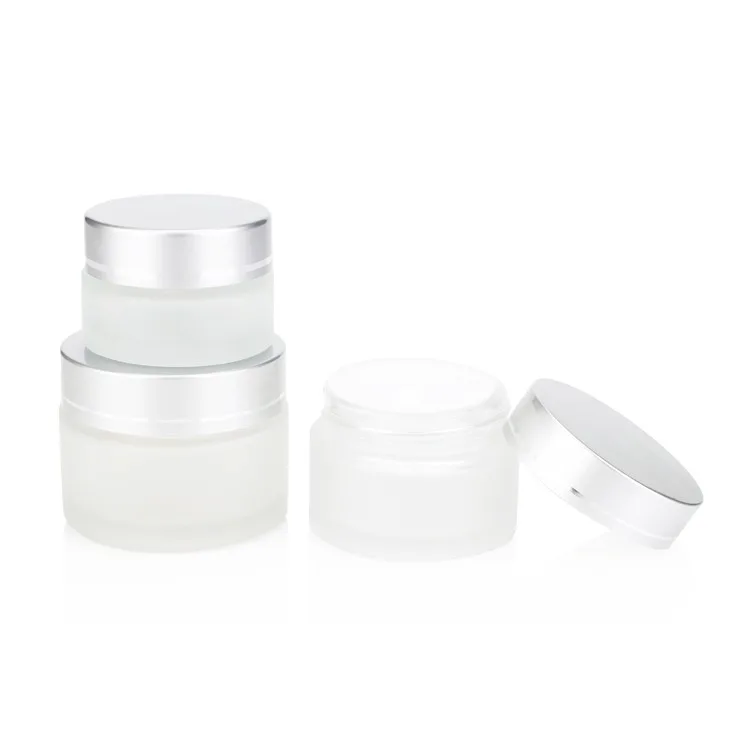small glass makeup jars