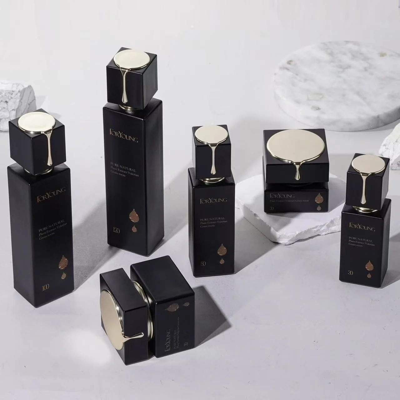 Black and gold skincare packaging collection