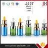 20ml 30ml 40ml Amber Blue Green Transparent Black Cylinder Round 30ml Glass Dropper Bottle With Childproof Cap For Cosmetic