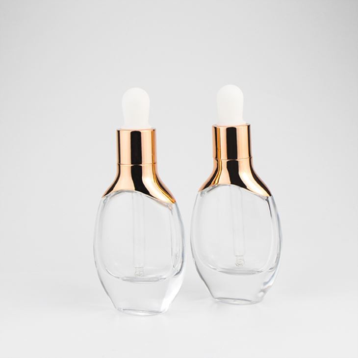 Luxury Cosmetic Packaging 15ml 30ml Oval Shape Unique Glass Dropper Bottle