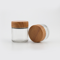 2 4 Ounce CR Flush Cap Flower Tall Glass Jar With Wood Lid