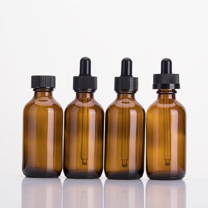 2 Oz 4 Oz Amber Boston Round Glass Bottle With Black Poly Cone Cap