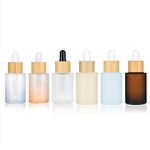 Glass Round Colored 1 Oz Dropper Bottles With Bamboo Lid