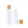 100ml 150ml White Plastic Lotion Essential Oil Bottles With Bamboo Cap