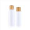 100ml 150ml White Plastic Lotion Essential Oil Bottles With Bamboo Cap