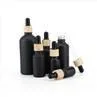 15 30 50 Ml Matte Black Oil Glass Dropper Bottle With Bamboo Dropper Cap
