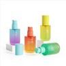 Round Glass Colored 1 Oz Lotion Pump Bottles