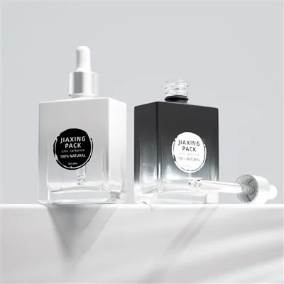 Square 1 Oz Clear Glass Dropper Bottles